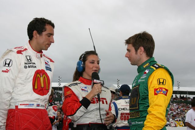 Justin Wilson, left, being interviewed prior to start of race with Will Power on right. -- Photo by: Chris Jones