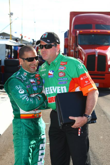 AGR driver Tony Kanaan talks with crew member prior to race. -- Photo by: Ron McQueeney