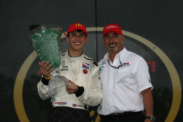 Race winner Graham Rahal, with dad Bobby on podium. -- Photo by: Steve Snoddy
