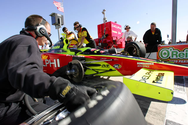 # 8 Kelley Racing crew members prepare driver Scott Sharp's car -- Photo by: Ron McQueeney