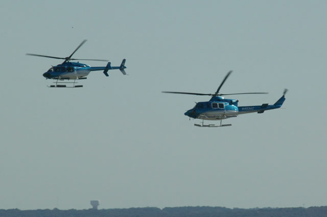 Helicopters leave Texas Motor Speedway facility -- Photo by: Shawn Payne