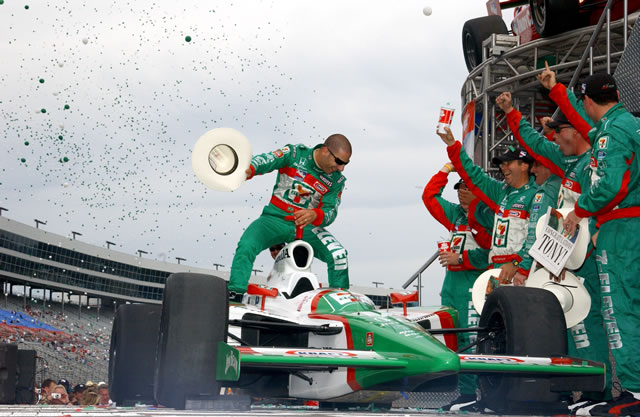 # 11 Team 7-11 driver Tony Kanaan and crew celebrate winning the 2004 Championship, Texas style -- Photo by: Dana Garrett