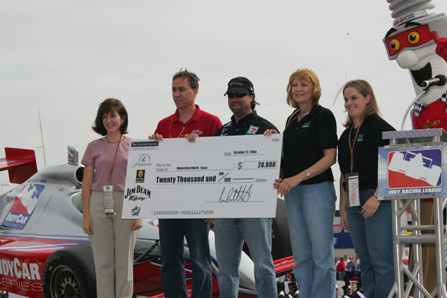 Michael Andretti, center, makes presentation to University of North Texas on behalf of sponsor Jim Beam -- Photo by: Ron McQueeney