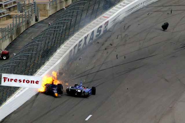 Fourth turn incident between drivers Alex Barron, left, & Dario Franchitti -- Photo by: Shawn Payne