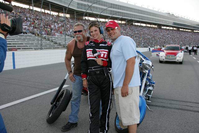 Jamie Little poses with Paul, and Paul Jr. of Orange County Choppers. -- Photo by: Ron McQueeney