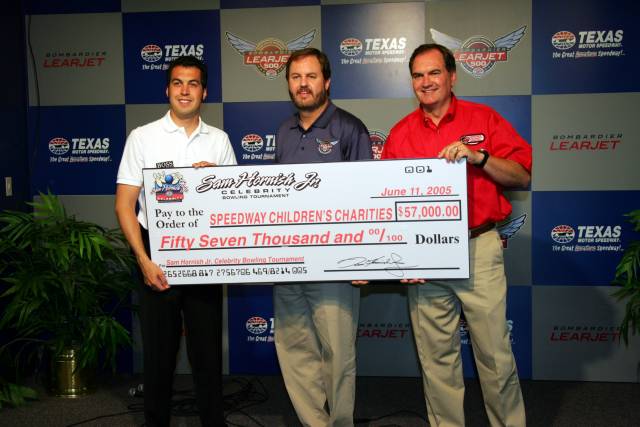 Sam Hornish Jr. Presents check to Speedway Charities-Texas Chapter. -- Photo by: Shawn Payne