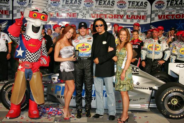 Tomas Scheckter with Gene Simmons and Co. after the Bombardier Learjet 500k. -- Photo by: Shawn Payne