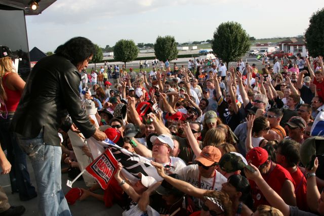 Gene Simmons signs autographs from the i am INDY stage at the Texas Motor Speedway. -- Photo by: Chris Jones