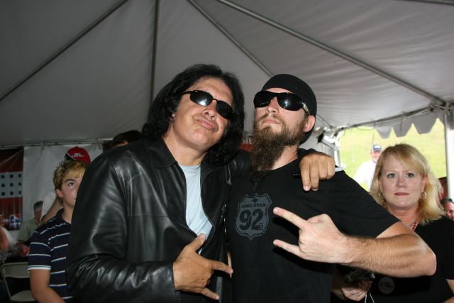Gene Simmons poses for pictures with fans at Texas Motor Speedway before the Bombardier Learjet 550k. -- Photo by: Chris Jones