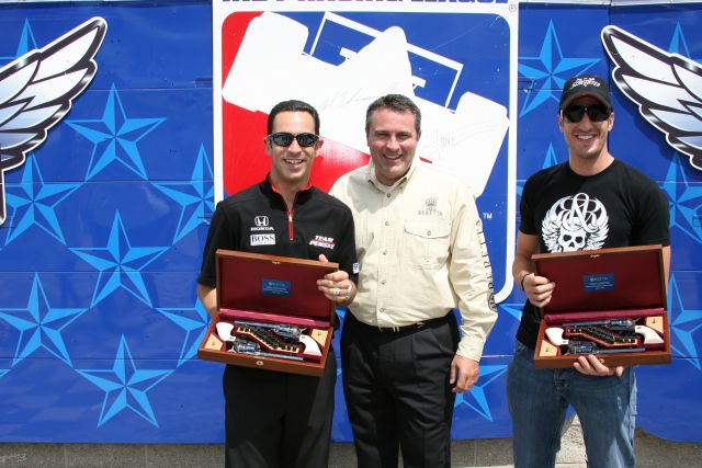 Helio Castroneves and Tomas Scheckter were presented matched pairs of Beretta Stampedes in Victory Circle before the Bombardier Learjet 550k. -- Photo by: Shawn Payne