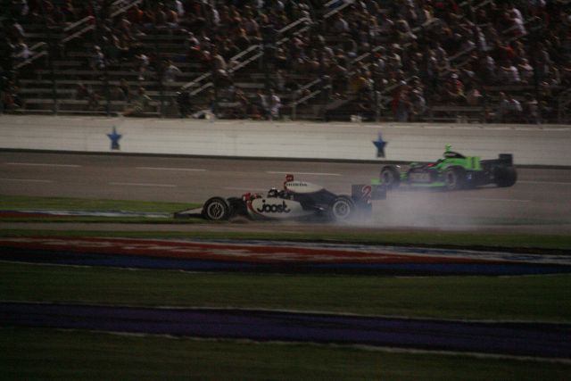 Tomas Scheckter runs into the grass after making contact with Marco Andretti during the Bombardier Learjet 550k. -- Photo by: Shawn Payne