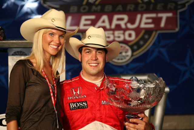 Sam Hornish Jr. celebrates his victory in the Bombardier Learjet 550k with his wife, Crystal. -- Photo by: Shawn Payne