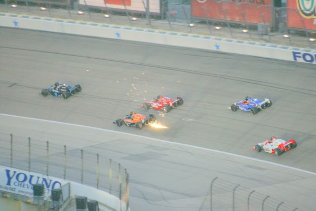 Sparks fly as the cars bottom out early in the race due to fuel load during the Bombardier Learjet 550k at Texas Motor Speedway -- Photo by: Steve Snoddy