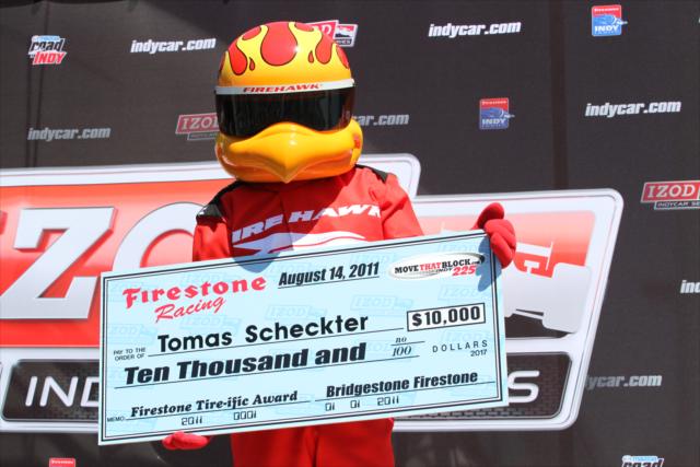 The Firestone Firehawk accepts the Firestone Tire-riffic Award on behalf of Tomas Scheckter -- Photo by: Shawn Gritzmacher