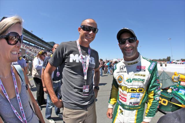 Tony Kanaan with an excited fan -- Photo by: Shawn Gritzmacher