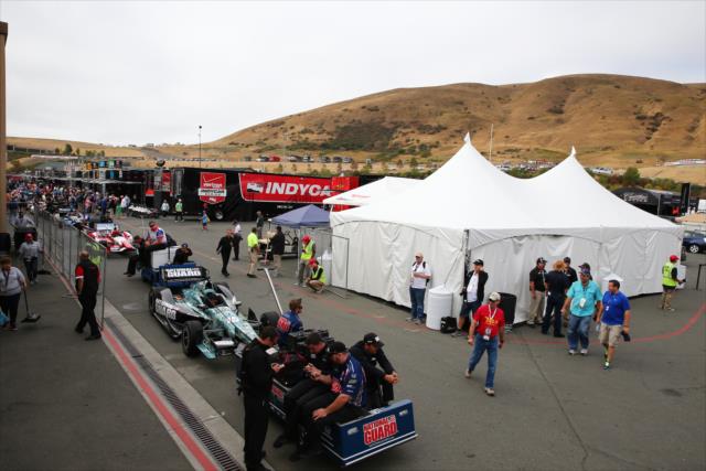 Cars begin making their way from the Sonoma Raceway paddock to pit lane prior to practice for the GoPro Grand Prix of Sonoma -- Photo by: Chris Jones