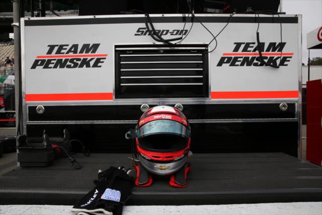 The helmet & gloves of Juan Pablo Montoya sit idle on pit lane wall prior to practice for the GoPro Grand Prix of Sonoma -- Photo by: Chris Jones