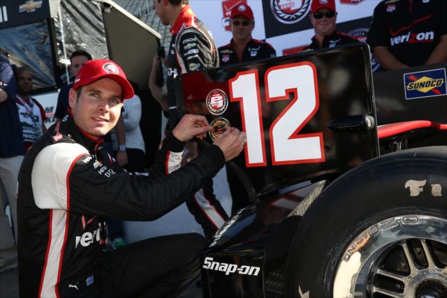 Will Power affixes the Verizon P1 Award emblem after winning the pole position for the GoPro Grand Prix of Sonoma at Sonoma Raceway -- Photo by: Chris Jones