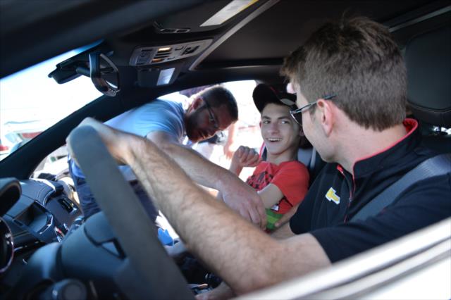 Will Power prepares to give Brian McEnnerney a pace car ride at Sonoma Raceway -- Photo by: John Cote