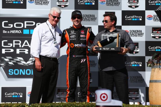 Simon Pagenaud accepts his 3rd Place trophy for the GoPro Grand Prix of Sonoma at Sonoma Raceway -- Photo by: Chris Jones
