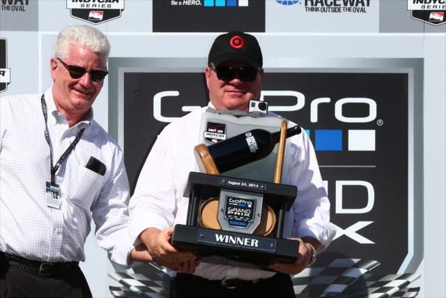 Chip Ganassi accepts the winning car owner trophy for the GoPro Grand Prix of Sonoma at Sonoma Raceway -- Photo by: Chris Jones