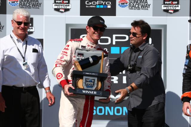 Scott Dixon accepts his Winners Trophy in Victory Circle after winning the GoPro Grand Prix of Sonoma at Sonoma Raceway -- Photo by: Chris Jones