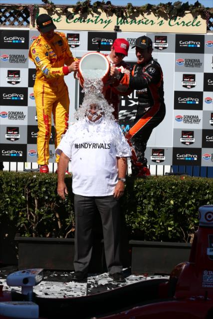 The podium of Scott Dixon, Ryan Hunter-Reay, and Simon Pagenaud dump an ice bucket over INDYCAR CEO Mark Miles in Victory Lane at Sonoma Raceway -- Photo by: Chris Jones