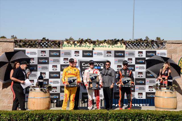 The podium of Scott Dixon, Ryan Hunter-Reay, and Simon Pagenaud with their trophies following the GoPro Grand Prix of Sonoma at Sonoma Raceway -- Photo by: John Cote