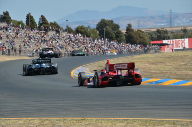 The field heads down the backstretch esses during the GoPro Grand Prix of Sonoma at Sonoma Raceway -- Photo by: John Cote