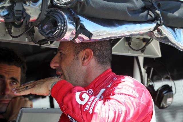 Tony Kanaan chats with his team following the morning warmup for the GoPro Grand Prix of Sonoma at Sonoma Raceway -- Photo by: Richard Dowdy