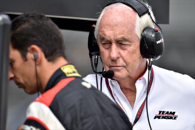 Roger Penske chats with driver Helio Castroneves prior to practice for the GoPro Grand Prix of Sonoma at Sonoma Raceway -- Photo by: John Cote