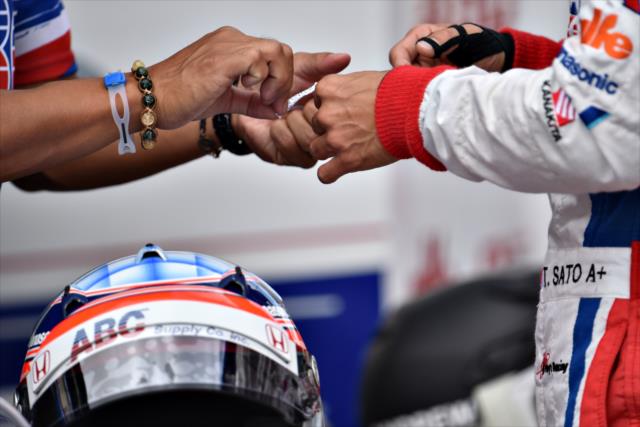 Takuma Sato gets some extra protection on his fingers prior to practice for the GoPro Grand Prix of Sonoma at Sonoma Raceway -- Photo by: John Cote