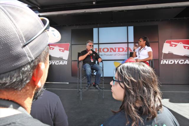 Mario Andretti chats during a Q&A session in the INDYCAR Fan Village at Sonoma Raceway -- Photo by: Richard Dowdy