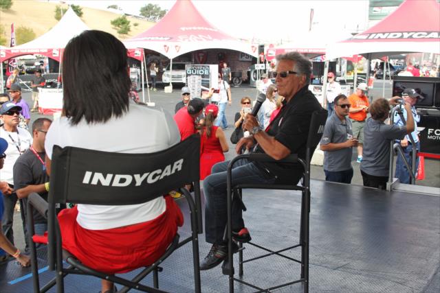 Mario Andretti answers a question during a Q&A session in the INDYCAR Fan Village at Sonoma Raceway -- Photo by: Richard Dowdy