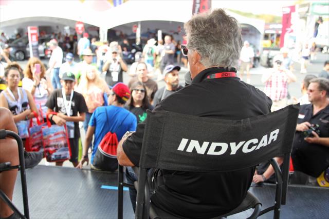 Mario Andretti answers a questions during a Q&A session in the INDYCAR Fan Village at Sonoma Raceway -- Photo by: Richard Dowdy
