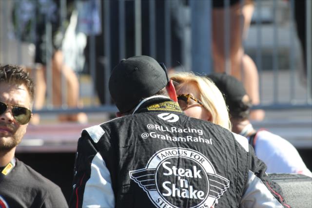 Graham Rahal with a good luck kiss from fiancee, Courtney Force, prior to qualifications for the GoPro Grand Prix of Sonoma at Sonoma Raceway -- Photo by: Richard Dowdy