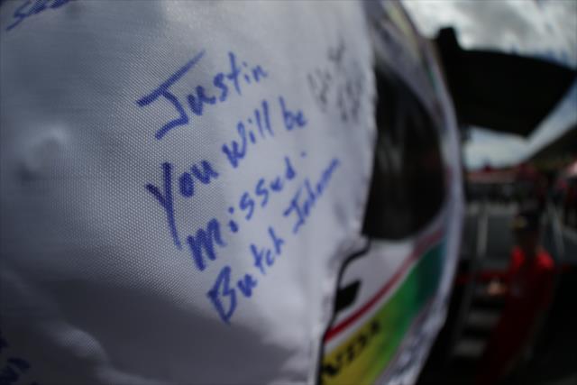 A heartfelt message written on the Justin Wilson tribute message in the INDYCAR Fan Village at Sonoma Raceway -- Photo by: Shawn Gritzmacher