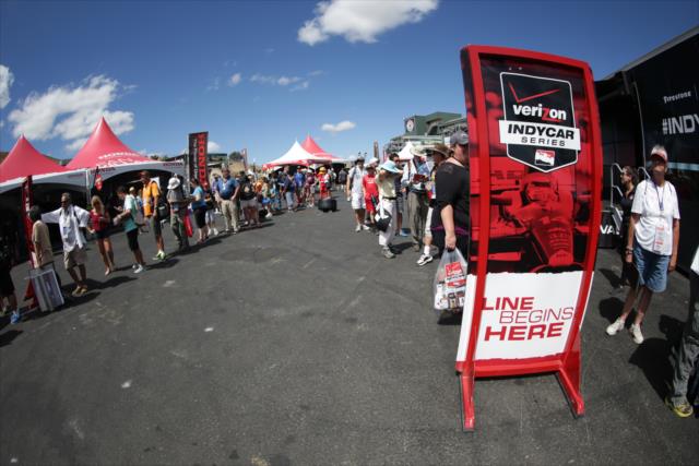 Fans line up for autographs in the INDYCAR Fan Village at Sonoma Raceway -- Photo by: Shawn Gritzmacher