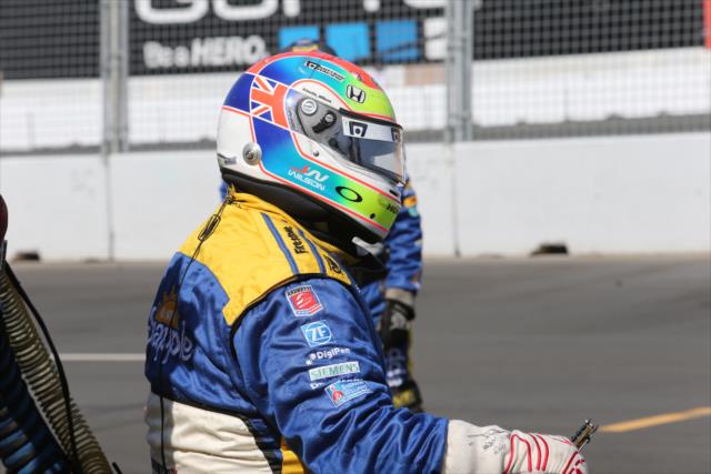 Fueler for Marco Andretti wears a helmet in Justin Wilson's honor during the GoPro Grand Prix of Sonoma at Sonoma Raceway -- Photo by: Chris Jones