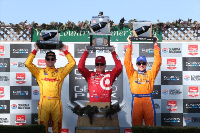 Scott Dixon, Ryan Hunter-Reay, and Charlie Kimball hoist their trophies in Victory Circle following the GoPro Grand Prix of Sonoma at Sonoma Raceway -- Photo by: Chris Jones