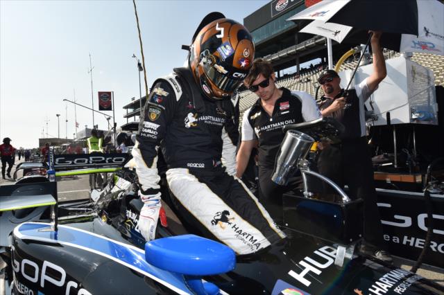 Josef Newgarden slides into his CFH Racing Chevrolet prior to the final practice for the GoPro Grand Prix of Sonoma at Sonoma Raceway -- Photo by: Chris Owens
