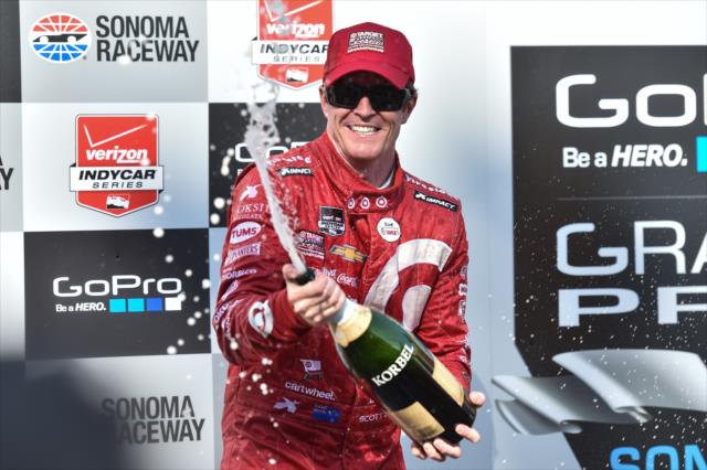 Scott Dixon sprays the champagne in Victory Circle following his win in the GoPro Grand Prix of Sonoma and becoming the 2015 Verizon IndyCar Series Champion -- Photo by: Chris Owens