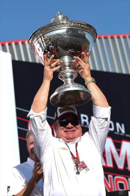 Team Owner Chip Ganassi hoists the Astor Cup after winning the 2015 Verizon IndyCar Series Championship -- Photo by: Chris Owens