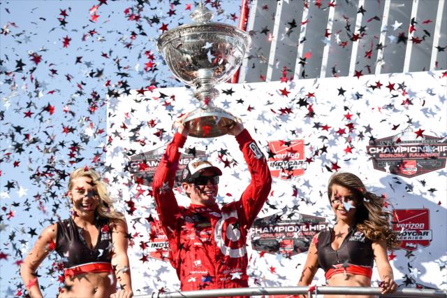 Scott Dixon hoists the Astor Cup as the 2015 Verizon IndyCar Series Champion -- Photo by: Chris Owens
