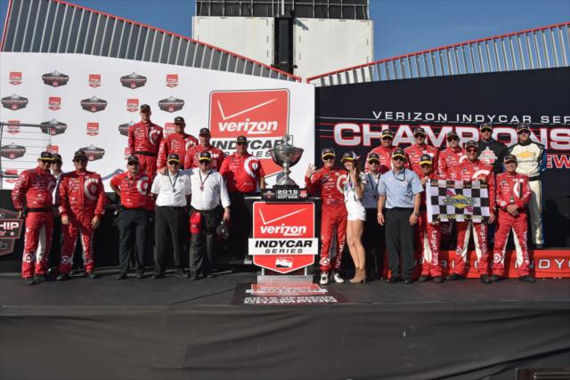 Scott Dixon and the entire Target Chip Ganassi Racing team celebrate as the 2015 Verizon IndyCar Series Champions -- Photo by: John Cote