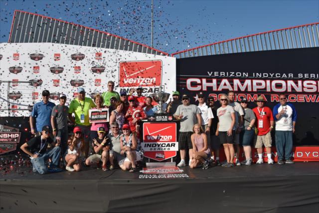 Scott Dixon celebrates his 2015 Verizon IndyCar Series championship with INDYCAR Nation Champion members following the GoPro Grand Prix of Sonoma -- Photo by: John Cote