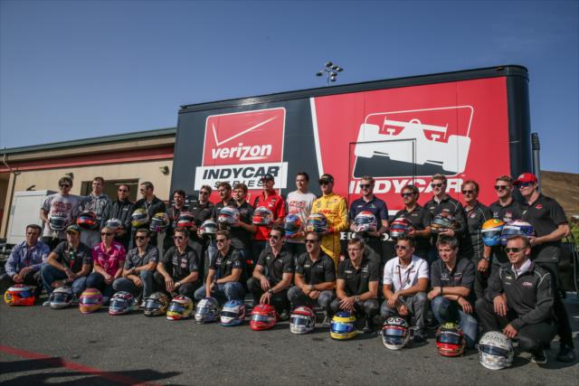 Verizon IndyCar Series drivers gather with their helmets to be auctioned for the Wilson Children's Fund following the GoPro Grand Prix of Sonoma -- Photo by: Shawn Gritzmacher