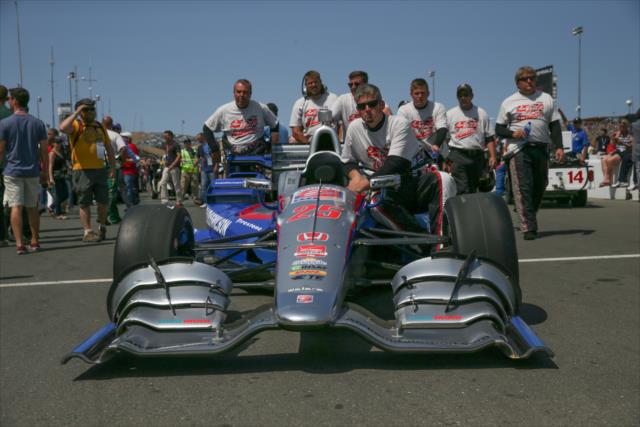 The Honda of Oriol Servia is rolled out on pit lane during pre-race ceremonies for the GoPro Grand Prix of Sonoma -- Photo by: Shawn Gritzmacher