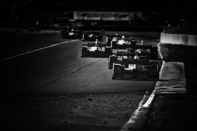 The field streams toward Turn 7 during the GoPro Grand Prix of Sonoma -- Photo by: Shawn Gritzmacher