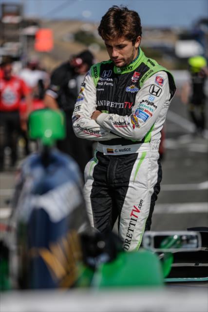 Carlos Munoz waits along pit lane following the final warmup for the GoPro Grand Prix of Sonoma at Sonoma Raceway -- Photo by: Shawn Gritzmacher